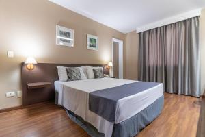 Postel nebo postele na pokoji v ubytování Gran Villagio Hotel SP by Castelo Itaipava