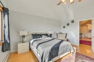 a bedroom with a bed and a living room at Cozy Levittown Apartment Full Kitchen and Smart TV! 