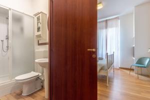 a bathroom with a toilet and a sink at Il Terrazzino Su Boboli in Florence