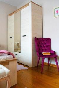 Postel nebo postele na pokoji v ubytování Infinity Boutique Apartments