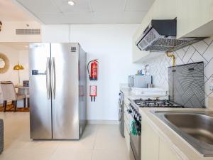 Foto dalla galleria di Elite LUX Holiday Homes - Modern 1BR Resort Amenities in Production City Dubai a Dubai Altre 20 foto