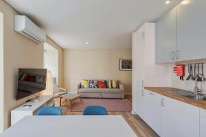 Kuchyň nebo kuchyňský kout v ubytování Setúbal Downtown Bocage III e IV