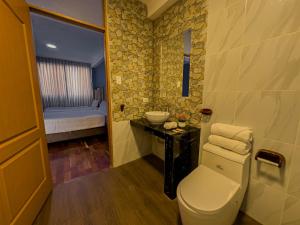 Posezení v ubytování Pisonay Hotel + 37 fotografií