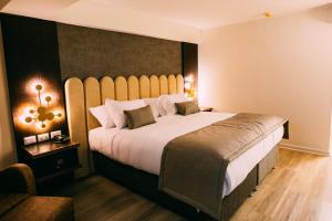 En eller flere senger på et rom på Hotel HW High Wellness