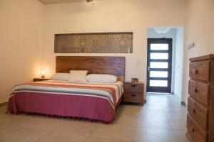 En eller flere senge i et værelse på La Ventana Beach Resort