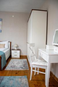 Postel nebo postele na pokoji v ubytování Infinity Boutique Apartments