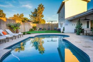 a swimming pool in the backyard of a house at Citrus Grove in Mesa