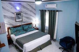 Ліжко або ліжка в номері EKA ELITE HOTEL