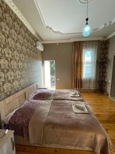 Letto o letti in una camera di Elco