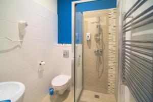 Kúpeľňa v ubytovaní Focus Point Apartments + 21 fotografií