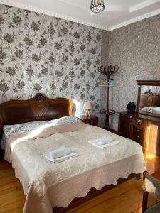 Letto o letti in una camera di Elco