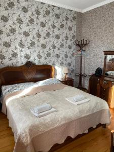 Letto o letti in una camera di Elco