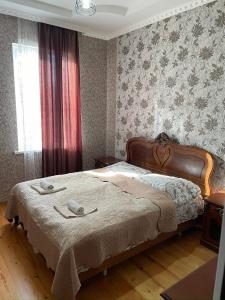 Letto o letti in una camera di Elco