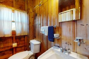 a bathroom with a toilet and a sink at Castine Cottages #6 in Castine