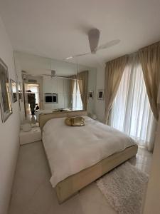 Posteľ alebo postele v izbe v ubytovaní Condominio Imperiale