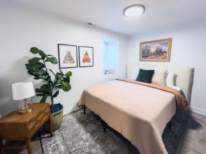 Katil atau katil-katil dalam bilik di Ultra-modern Home in the Perfect Location
