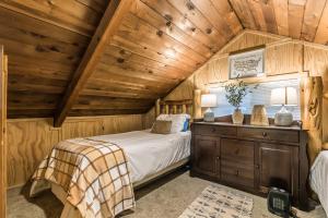 A bed or beds in a room at Chester Cabin BY Betterstay
