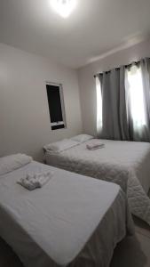 Postel nebo postele na pokoji v ubytování APARTAMENTO JOÃO PESSOA BESSA