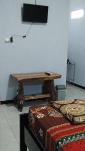 Televisi dan/atau pusat hiburan di Setiya Homestay
