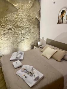 Posteľ alebo postele v izbe v ubytovaní B&B L'Arenaria