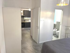 Ένα ή περισσότερα κρεβάτια σε δωμάτιο στο Bologna Homes +16 φωτογραφίες