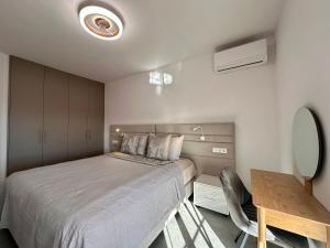 Katil atau katil-katil dalam bilik di Sunset Apartment 3 & Heated pool