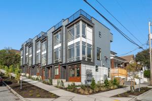 an apartment building on the corner of a street at Wallingford View Suite BY Betterstay in Seattle