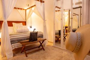 Postel nebo postele na pokoji v ubytování Leones de Alba Hotel Boutique