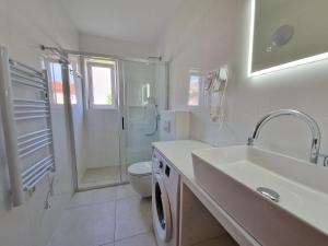 Koupelna v ubytování APARTMENTS JOSIPA