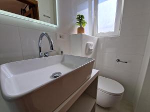 Koupelna v ubytování APARTMENTS JOSIPA