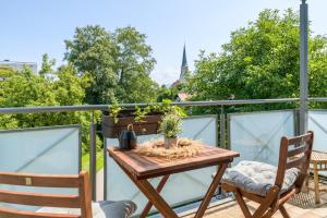 Balkon atau teras di 2OG Mitte Wunderschöne 68m² große 2-Zimmer City Wohnung nähe Salzburg