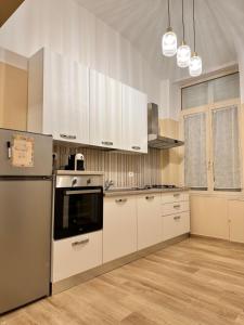 Η κουζίνα ή μικρή κουζίνα στο Barbara Apartment