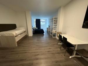 Giường trong phòng chung tại Apartamentos R&K 26B