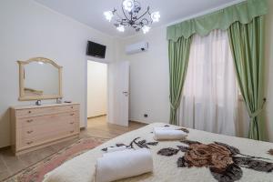 Posteľ alebo postele v izbe v ubytovaní Casa da Flo'