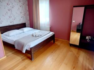 Letto o letti in una camera di STOP HOUSE Mestia