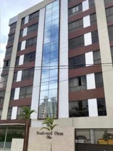 a tall building with a lot of windows on it at Flat com localização privilegiada in Campina Grande