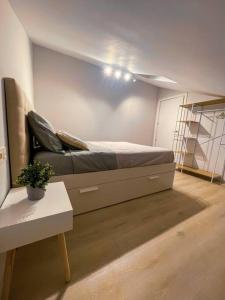 Ένα ή περισσότερα κρεβάτια σε δωμάτιο στο Portu - Apartamento en el puerto de Elantxobe