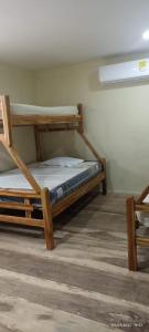 Een bed of bedden in een kamer bij hoel joss