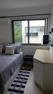 Area tempat duduk di Apartamento Frente Lagoa - RJ