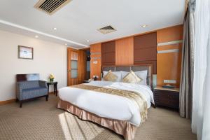 Postel nebo postele na pokoji v ubytování Yihe Hotel Ouzhuang