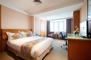 TV a/nebo společenská místnost v ubytování Yihe Hotel Ouzhuang