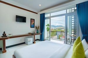Kampot View Boutique客房内的一张或多张床位