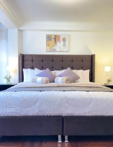 Llit o llits en una habitació de Allincay Cusco Apart Hotel