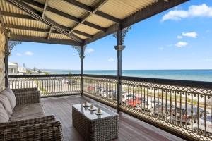 a balcony with a view of the ocean at Swainson at Del Monte in Henley Beach South