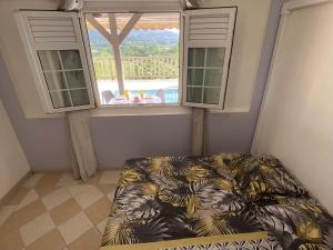 Postel nebo postele na pokoji v ubytování Appartement T2 B - vue campagne