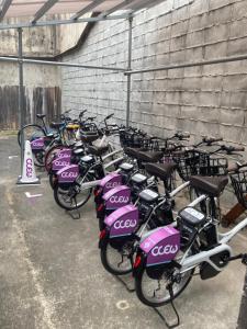 a bunch of bikes parked in a parking lot at 澄の宿 京都伏见稻荷別邸 京阪电车伏见稻荷站徒步1分钟 jr电车稻荷站徒步4分钟 in Kyoto
