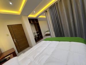 Cama ou camas em um quarto em EL ALAMO, EJECUTIVO Y SPA