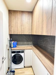 Kuchyň nebo kuchyňský kout v ubytování Apartmány nad Anenským potokem - Říčky