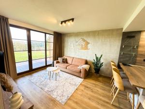 Posezení v ubytování Apartmány nad Anenským potokem - Říčky