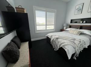 Katil atau katil-katil dalam bilik di The Shaddy Rest secluded resort for the perfect romantic getaway